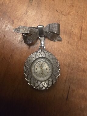 vintage Chateau pendant watch featuring a bow-shaped pin (Not Working)